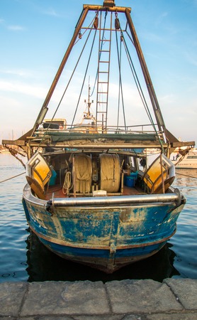 A typical fishing vessel, from the back.の写真素材