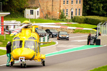 The East Midlands Air Ambulance airlifting a patient to the nearest hospital.のeditorial素材