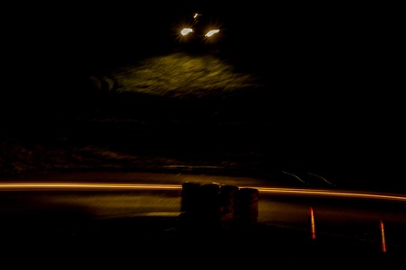 A rally undertaken on a racetrack, carried out at night / dusk.の写真素材
