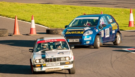 18th November 2018 - Cadwell Park, Lincolnshire, United Kingdom. Competitors race around a tarmac racetrack in their modified and powered rally cars.のeditorial素材