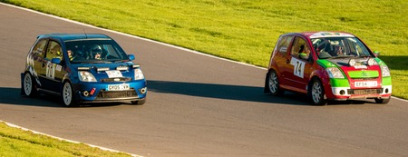 18th November 2018 - Cadwell Park, Lincolnshire, United Kingdom. Competitors race around a tarmac racetrack in their modified and powered rally cars.のeditorial素材