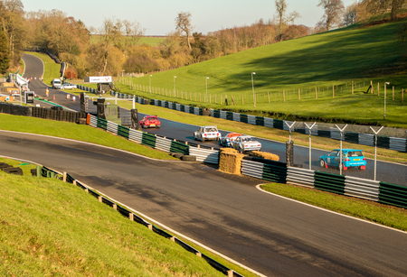 18th November 2018 - Cadwell Park, Lincolnshire, United Kingdom. Competitors race around a tarmac racetrack in their modified and powered rally cars.のeditorial素材