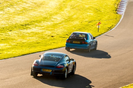 18th November 2018 - Cadwell Park, Lincolnshire, United Kingdom. Competitors race around a tarmac racetrack in their modified and powered rally cars.のeditorial素材