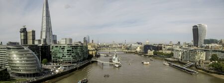 A typical view of the famous London skyline and it's huge buildings that engulf the area filled with businesses and apartments.の写真素材