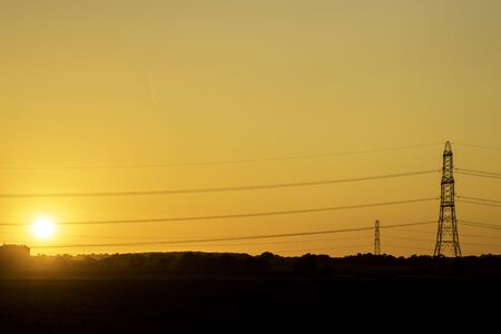 A beautiful sunset on the horizon of the British countryside.