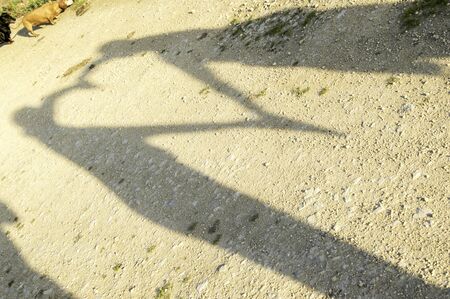 As the sun sets on the horizon shadows are often fun to play with, here seen a heart created, on a...