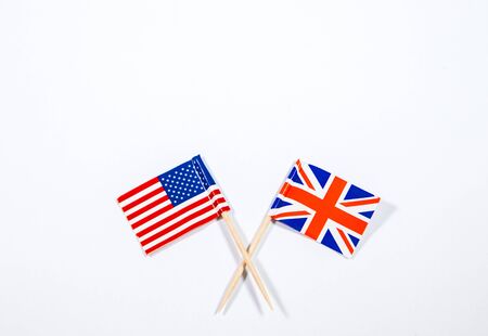 American and British flags together to symbolize the alliance friendship between the two counties.の写真素材