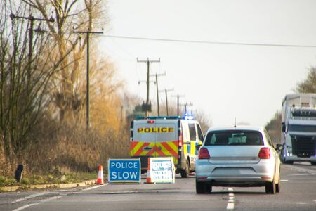 Police have coned off a lane of a busy main road, in the United Kingdom, to prevent any further...