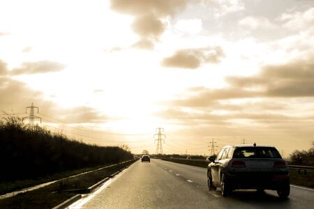 A typical view along one of the thousands of roads that network the United Kingdom for pleasure or business.の写真素材