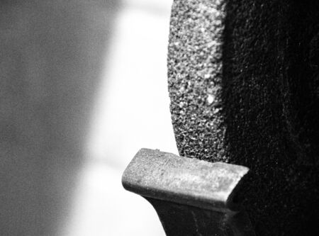 A bench grinding machine used to sharper tools, grind down metal and wood.