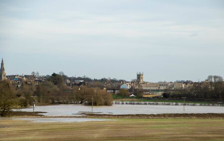 Fields are submerged below the waterline as rainfall increases on the British countryside.の写真素材