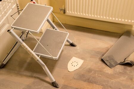 A large amount of dust that has accumulated from sanding down walls and wood.