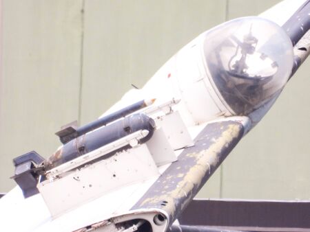An old type aircraft carrier aircraft wing that folds over. The insides of the wing frame seen closest to the camera.の写真素材
