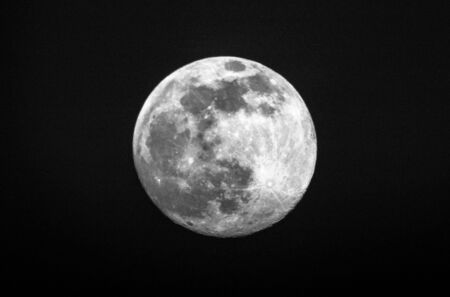 The Moon being the closest to the Earth, full of adventure and discovery. Bright above our skies on crisp clear nights.の写真素材