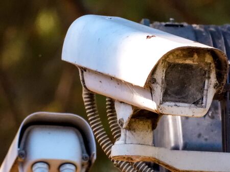 A cluster of CCTV cameras on a post keeping the security of a housing complex.