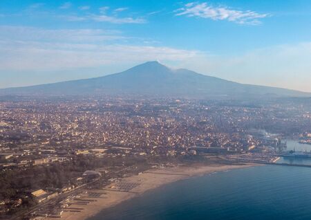 One of the most active volcanoes in the world seen here smoking after a large eruption. This is Mount Etna, located in Sicily, Italy.の写真素材