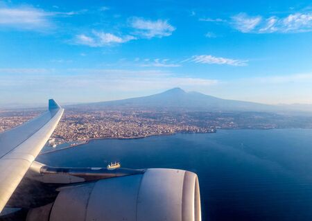 One of the most active volcanoes in the world seen here smoking after a large eruption. This is Mount Etna, located in Sicily, Italy.の写真素材