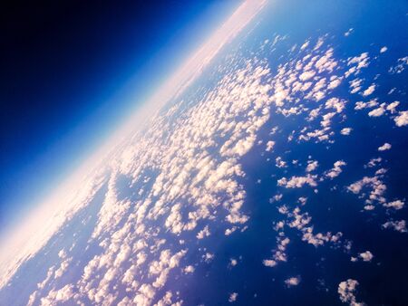 A view of our wonderful Planet Earth, from above. Cloud patterns cover the Earth's surface bringing all types of weather.の写真素材