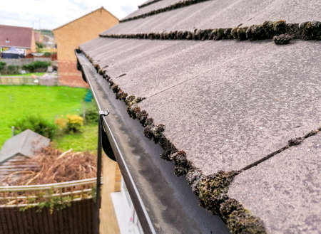 A view along guttering from high up off the ground, at the top of a typical house in the United...