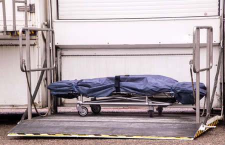 A mortuary stretcher left sat outside a mobile scanning unit in the United Kingdom. The mobile...