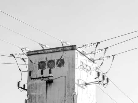 Pylons stretch across the lands of Sicily, Italy, here is just one look at the power source that has been installed to take electric from one location to the next.の写真素材
