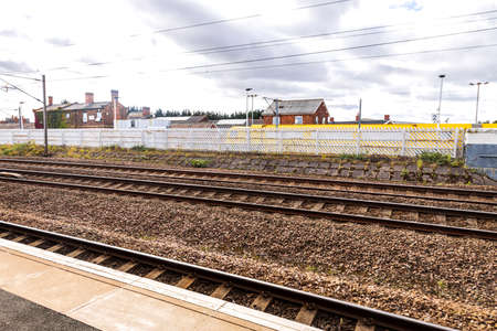 A view of a typical train station platform, in the United Kingdom. Empty at the time of the photo...
