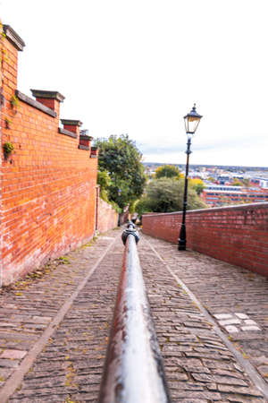 A very old Victorian style cobbled path, within the heart of Lincoln city, Lincolnshire in England.の写真素材