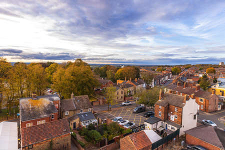 October 29, 2021 â Lincoln, United Kingdom. Lincolnshire is one of the most popular cities in the United Kingdom. Here a view from Lincoln Castle looking across the city just before sunset, on a cold evening.のeditorial素材