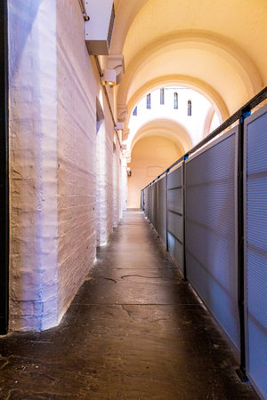 Victorian style prison walkways, in a British Prison, where some of the most dangerous prisoner's in the world used to look out of them.のeditorial素材