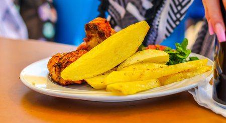Giant and delicious homemade chips sliced, cooked and ready to eat.の写真素材