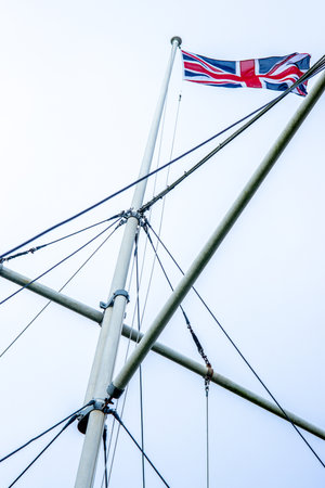 Lines and poles on a ships mast, seen from below.の写真素材