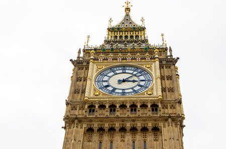 Big Ben, otherwise known as the Elizabeth Tower stands tall over London, United Kingdom. It's iconic design has towered London throughout history.の写真素材