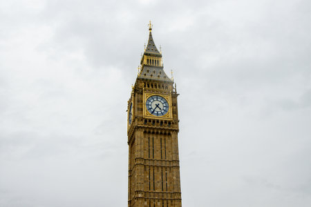Big Ben, otherwise known as the Elizabeth Tower stands tall over London, United Kingdom. It's iconic...