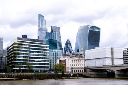 Skyscrapers and other unique building designs make up the cityscape of London, in the United Kingdom.の写真素材