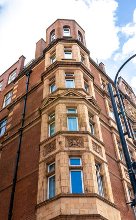 London, United Kingdom, is packed with various buildings new and old, here seen one which has stood for many decades.の写真素材