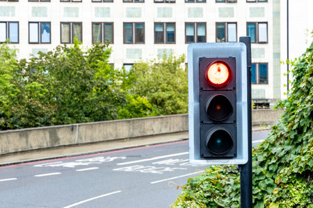 Traffic lights are what controls vehicles taking turns at moving across difficult intersections to...