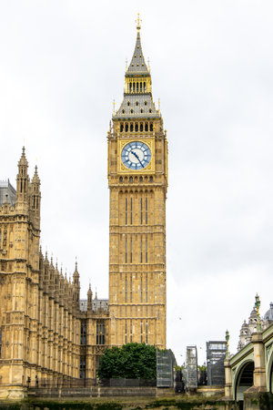 Big Ben, otherwise known as the Elizabeth Tower stands tall over London, United Kingdom. It's iconic design has towered London throughout history.の写真素材