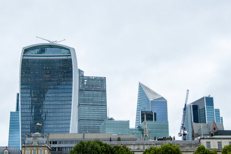 Skyscrapers and other unique building designs make up the cityscape of London, in the United Kingdom.の写真素材