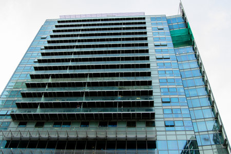 Offices and accommodation offered within a modern building located within a large city location.の写真素材