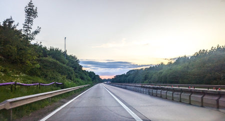 When travelling in the United Kingdom road users will often have this view of a motorway when driving to their destination.の写真素材