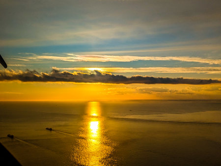 A view from above the English Channel where boats of all types pass through. Here seen with the sun setting creating beautiful colours.の写真素材