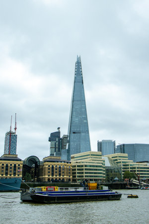 The Shard is a sharp skyscraper that stands tall over London, United Kingdom, visited by millions per year.の写真素材