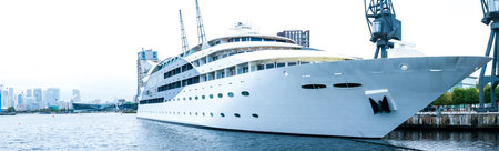 A large superyacht that is used or owned by people of wealth. Often used to take people of business people on holidays and trips across the world.の写真素材