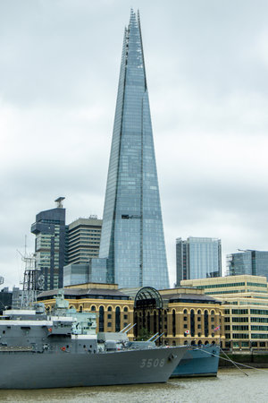 The Shard is a sharp skyscraper that stands tall over London, United Kingdom, visited by millions per year.の写真素材