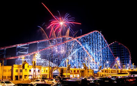 Blackpool Pleasure Beach hosting a night fireworks display within the grounds of the Pleasure Beach rides location for all around to enjoy.の写真素材