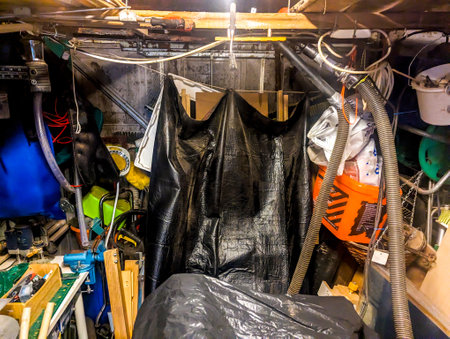 A very full and packed out garage that has been filled and filled over many years with all kinds of tools and machines etc.の写真素材