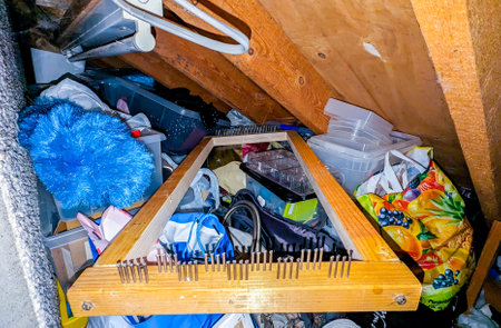 A craft lover who has gone out of control of collecting craft items so much so that walking space within a room is impossible.の写真素材