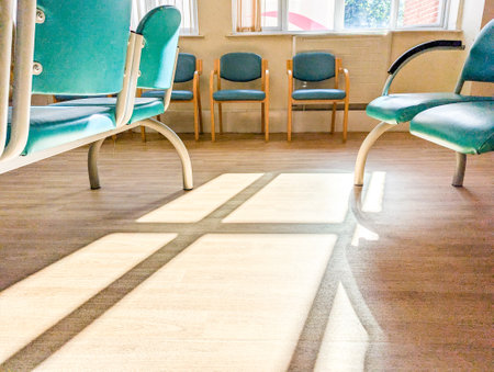 Patients and visitors often first have to start at a Hospital Waiting room to be seen by a Nurse or Doctor, which can often be a very long wait with minimal facilities.の写真素材