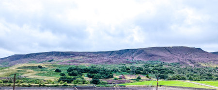 The Peak District is enjoyed by millions of tourists per year but also by regular commuters who travel through it.の写真素材