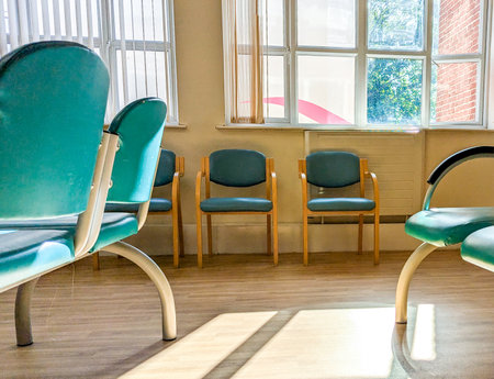 Patients and visitors often first have to start at a Hospital Waiting room to be seen by a Nurse or Doctor, which can often be a very long wait with minimal facilities.の写真素材